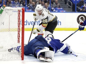 Tampa Bay Lightning goaltender Andrei Vasilevskiy (88) stretches out to stop a shot by Vegas Golden Knights center Paul Stastny (26) during the first period of an NHL hockey game Tuesday, Feb. 5, 2019, in Tampa, Fla.