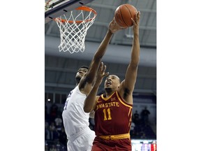 Iowa State guard Talen Horton-Tucker (11) has his shot blocked by TCU's Kevin Samuel (21) in the first half of an NCAA college basketball game in Fort Worth, Texas, Saturday, Feb. 23, 2019.
