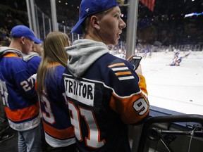 A New York Islanders fan lets everyone know his opinion of former Islanders captain John Tavares, now with the Toronto Maple Leafs, before an NHL hockey game between the teams Thursday, Feb. 28, 2019, in Uniondale, N.Y.