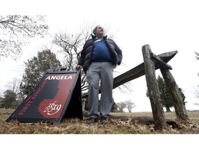 In this Feb. 1, 2019 photo, Mark Summers, a historian at Historic Jamestowne poses for a photo in Jamestown, Va. Summers leads tourists down paths once used by Angelo, also known as Angela, who was one of the first Africans to arrive in North America. Although there's not much known about Angela, Summers said being able to show people where she lived and the grounds she walked is a spiritual experience for some.