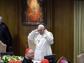 Pope Francis arrives for the opening of the second day of a Vatican's conference on dealing with sex abuse by priests, at the Vatican, Friday, Feb. 22, 2019. Pope Francis has issued 21 proposals to stem the clergy sex abuse around the world, calling for specific protocols to handle accusations against bishops and for lay experts to be involved in abuse investigations.