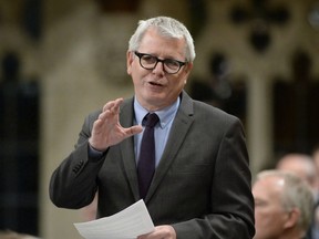 Adam Vaughan rises during Question Period in the House of Commons on Parliament Hill in Ottawa on Friday, March 24, 2017. Vaughan has apologized for a tweet sent Saturday morning that many on Twitter took as a threat against Ontario Premier Doug Ford.