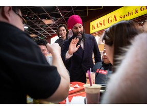 NDP Leader Jagmeet Singh campaigns for the federal byelection, in the food court at an Asian mall in Burnaby, B.C., on Sunday, Feb. 24, 2019. Byelections will be held Monday in three vacant ridings - Burnaby South, where Singh is hoping to win a seat in the House of Commons, the Ontario riding of York-Simcoe and Montreal's Outremont.