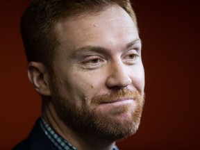 B.C. Lions quarterback Travis Lulay pauses during a news conference after announcing he was retiring from playing CFL football, in Surrey, B.C., on Thursday February 28, 2019.