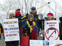 Anti-Nicolos Maduro protesters show their support for Venezuelan opposition leader Juan Guaido outside the 10th Lima Group in Ottawa on Feb. 4, 2019. 