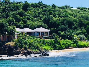 The villa at Tribu Mayreau is nestled in a hill of green.
