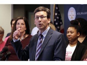 Washington state Attorney General Bob Ferguson speaks at a news conference announcing a lawsuit challenging the Trump administration's Title X "gag rule" Monday, Feb. 25, 2019, in Seattle. The rule issued last Friday would impact federal funding for reproductive health care and family planning services.