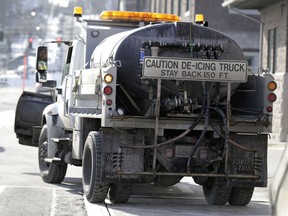 A de-icing truck filled with salt-brine fluid pulls away from a maintenance yard Thursday, Feb. 7, 2019, in Tacoma, Wash., during preparations for snow and ice expected to hit the area Friday and Saturday from an anticipated winter storm system.