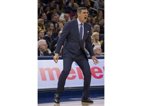 Villanova's head coach Jay Wright calls out to his players as they take on Marquette during the first half of an NCAA college basketball game Saturday, Feb. 9, 2019, in Milwaukee.