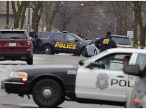 Milwaukee police block the intersection of 12th and Dakota after a Milwaukee Police officer was shot Wednesday, Feb. 6, 2019, on the city's south side, a law enforcement source said. The incident took place during the execution of a search warrant near the intersection of South 12th and W. Dakota Streets. No information was available about the condition of the injured officer. The shooter is in custody, the source said. Mayor Tom Barrett and Police Chief Alfonso Morales are at the scene. A media briefing is scheduled for 11 a.m. at the scene. A number of streets in the neighborhood have been closed due to the investigation.