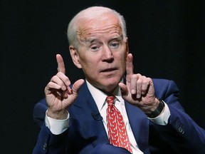 FILE - In this Dec. 13, 2018 file photo, former Vice President Joe Biden speaks at the University of Utah in Salt Lake City. Biden has been conspicuously absent from early voting states as he weighs a 2020 presidential campaign.  That makes him an outlier among Democrats eying the White House.
