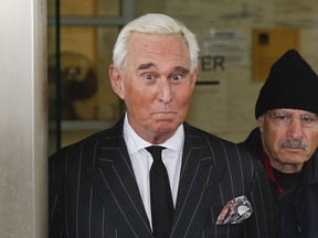 FILE - In this Feb. 1, 2019 file photo, former campaign adviser for President Donald Trump, Roger Stone, leaves federal court in Washington.