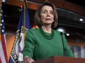 FILE - In this Dec. 20, 2018, Nancy Pelosi of California, talks to reporters at the Capitol in Washington. Democrats now own a stake in the state of the union. Members of the new House majority get to show off their new clout Feb. 5, 2019, when President Donald Trump delivers his first State of the Union address under divided government. Evidence of the changes afoot will be firmly in the television frame, with House Speaker Nancy Pelosi sitting above and behind Trump, in a position strengthened by his capitulation to her terms for reopening the government.