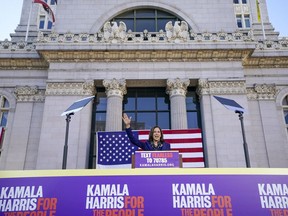 FILE - In this Jan, 27, 2019, file photo, Sen. Kamala Harris, D- Calif., waves to the crowd as she formally launches her presidential campaign at a rally in her hometown of Oakland, Calif. In tweets, public remarks and private conversations, President Donald Trump is making clear he is closely following the campaign to challenge him on the ballot next November. Facing no serious primary opponent of his own, at least so far, Trump is establishing himself as an active participant in the Democratic Party's nominating process.