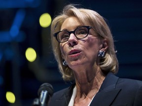 FILE - In this Sept. 17, 2018 file photo, Education Secretary Betsy DeVos speaks during a student town hall at National Constitution Center in Philadelphia. Democrats in Congress are accusing the Education Department of interfering with an investigation by the agency's independent watchdog. Five lawmakers sent a letter to DeVos on Feb. 19, 2019, staying her deputy pressured the department's inspector general on Jan. 3 to drop an internal investigation.