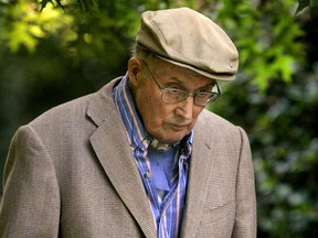 FILE - In this July 12, 2005, file photo, then-Chief Justice William Rehnquist departs his home in Arlington, Va. Justice Ruth Bader Ginsburg has missed a month of Supreme Court arguments as she recovers from lung cancer surgery. But she's not the first justice to be away for a while and her absence hardly compares with those of some of her predecessors. The most recent example of a justice missing substantial time was in 2004 and 2005, when Rehnquist was suffering from thyroid cancer and was not on the bench for 44 arguments over five months.