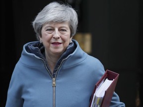 Britain's Prime Minister Theresa May leaves 10 Downing Street for the House of Commons for her weekly Prime Minister's Questions in London, Wednesday, Feb. 20, 2019. May is due to go the Brussels to meet EU leaders for further negotiation on Brexit.