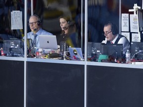 Former curling great Russ Howard, left, Vic Rauter, right, and Olympic curling silver medallist Cheryl Bernard, the TSN team at the Scotties Tournament of Hearts, call the action from the broadcast booth at Centre 200 in Sydney, N.S. on Tuesday, Feb. 19, 2019.