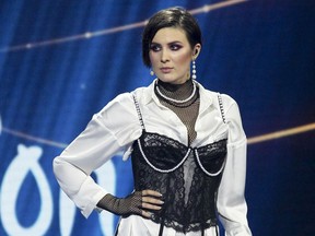 In this photo taken on Sunday, Feb. 24, 2019, Anna Korsun, who performs under the name of Maruv poses for a photo on stage at the national nomination for Eurovision in Kiev, Ukraine. Ukraine has pulled out of this year's Eurovision song contest following a politics-laden dispute between the singer who won the national competition and the country's national public broadcaster.