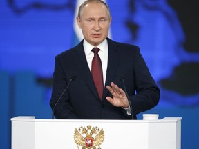 Russian President Vladimir Putin delivers a state-of-the-nation address in Moscow, Russia, Wednesday, Feb. 20, 2019. Putin said Russia needs to focus on raising living standards.