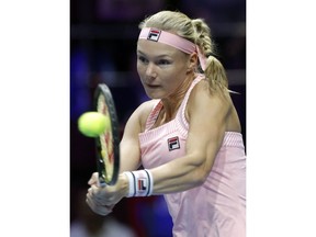 Kiki Bertens of Netherlands returns the ball to Aryna Sabalenka of Belarus during the St. Petersburg Ladies Trophy-2019 tennis tournament semifinal match in St.Petersburg, Russia, Saturday, Feb. 2, 2019.