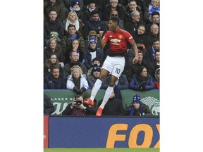 Manchester United's Marcus Rashford celebrates after scoring the opening goal during the English Premier League soccer match between Leicester City and Manchester United at the King Power Stadium in Leicester, England, Sunday, Feb 3, 2019.