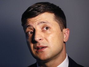 Ukrainian comedian and presidential candidate Volodymyr Zelenskiy speaks during his interview with The Associated Press, in Kiev, Ukraine, Wednesday, Feb. 6, 2019. Zelenskiy, who has taken the lead in Ukraine's presidential race, says his popularity reflects the public disillusionment with the nation's politicians.
