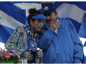 FILE - In this Sept. 5, 2018 file photo, the President of Nicaragua Daniel Ortega and his wife and Vice-President Rosario Murillo preside a rally in Managua, Nicaragua. President Ortega said Thursday, Feb. 21, 2019, that he will restart talks with his opponents, seven months after the last round of dialogue broke down and the government unleashed a round of arrests.