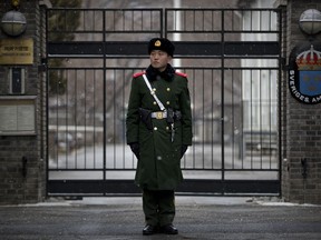 A paramilitary policeman stands guard at the gate of the Swedish Embassy in Beijing, Thursday, Feb. 14, 2019. The embassy said Thursday that Ambassador Anna Lindstedt has returned to Stockholm to be investigated by the country's foreign affairs ministry. She is not under criminal investigation.