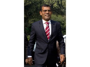 Former Maldives President Mohamed Nasheed arrives to deliver a lecture on climate change in New Delhi, India, Thursday, Feb. 14, 2019. In an interview to The Associated Press Thursday after giving a climate change lecture, Nasheed said the Indian Ocean archipelago nation is seeking tenders for renewable energy projects to help lessen the burden of foreign debt.