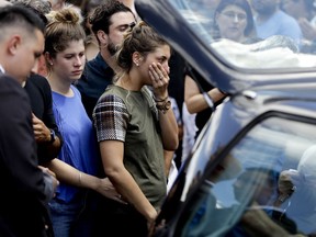 Romina Sala, the sister Argentine soccer player Emiliano Sala, cries at the end of her brother's wake in Progreso, Argentina, Saturday, Feb. 16, 2019. The Argentina-born forward died in an airplane crash in the English Channel last month when flying from Nantes in France to start his new career with English Premier League club Cardiff.