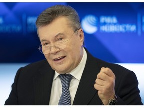 Former Ukraine President Viktor Yanukovych speaks during a news conference in Moscow, Russia, Wednesday, Feb. 6, 2019.