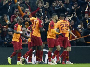 Galatasaray players celebrated a goal against Benfica during the Europa League round of 32 soccer match between Galatasaray and Benfica, in Istanbul, Thursday, Feb. 14, 2019.