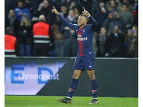 PSG's Kylian Mbappe celebrates after scoring his side's fifth goal during the French League One soccer match between Paris Saint Germain and Montpellier at the Parc des Princes stadium in Paris, France, Wednesday, Feb. 20, 2019.