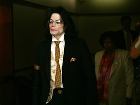 On June 3, 2005, Michael Jackson leaves the Santa Barbara County Courthouse for the second day of closing arguments in his child molestation trial.