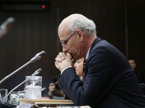 Privy Council Clerk Michael Wernick waits to testify before the House of Commons justice committee on March 6, 2019.