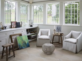 This photo provided by architect Jeffrey Dungan shows a home in Louisville, Tenn., where Dungan turned the upper level into an atelier for an artist.