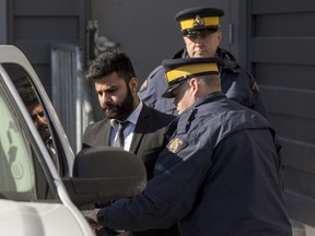 Jaskirat Singh Sidhu, the driver of a transport truck involved in the deadly crash with the Humboldt Bronco's bus, is taken into custody after sentencing.