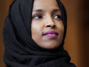 Ilhan Omar (D-MN) listens as lawmakers speak about the Voting Rights Enhancement Act, H.R. 4, on Capitol Hill on Feb. 26, 2019 in Washington, DC.