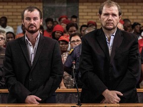 Pieter Doorewaard, 28, and Philip Schutte, 35, wait for their sentencing procedure on March 6, 2019 at the Mahikeng High Court in Mahikeng, South Africa.