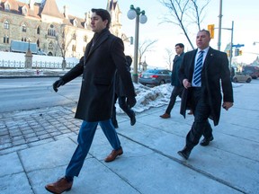 Prime Minister Justin Trudeau leaves the Prime Minister's Office before a press conference at the national press gallery in Ottawa, Ontario, on March 7, 2019.