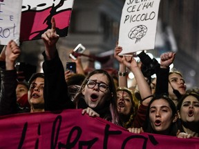 Women from the feminist movement "Non Una Meno" (Not One Less) take part in a protest march in Rome on March 8, 2019.