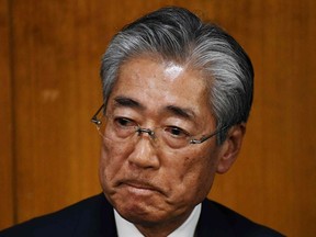 Japan's Olympic Committee President  Tsunekazu Takeda speaks to the press after a JOC board meeting in Tokyo on March 19, 2019.