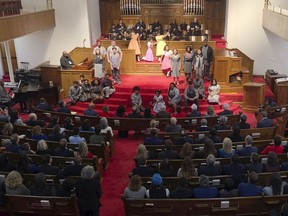 Members of Congress and others watch a play depicting the lives of four girls killed in a 1963 bombing at 16th Street Baptist Church in Birmingham, Ala., on Friday, March 1, 2019. Dozens of members of Congress are participating in a weekend-long pilgrimage civil rights pilgrimage through the state.