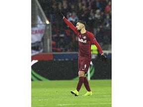 Salzburg's Munas Dabbur celebrates after scoring his side's first goal during the Europa League round of 16 second leg soccer match between FC Salzburg and Napoli in the Arena stadium in Salzburg, Austria, Thursday, March 14, 2019.