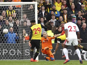 Watford's Etienne Capoue scores his side's first goal of the game  during the FA Cup quarter final soccer match between Watford and Crystal Palace , at Vicarage Road, in Watford, England, Saturday March 16, 2019.