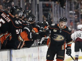 Anaheim Ducks' Jakob Silfverberg (33) celebrates his goal with teammates during the first period of an NHL hockey game against the Colorado Avalanche, Sunday, March 3, 2019, in Anaheim, Calif.