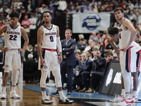 Gonzaga players react to a loss to Texas Tech during the West Regional final in the NCAA men's college basketball tournament Saturday, March 30, 2019, in Anaheim, Calif. Texas Tech won 75-69.