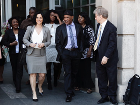 Archie Williams, third from right, was freed from prison on Thursday, after a court determined that he was wrongly convicted of rape and attempted murder in 1982.