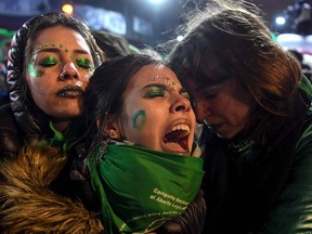 Activists decry on August 9, 2018, senators' decision to reject a bill to legalize abortion in Argentina.